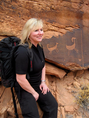 Shauna with one of the many petroglyphs to be found along the trail.