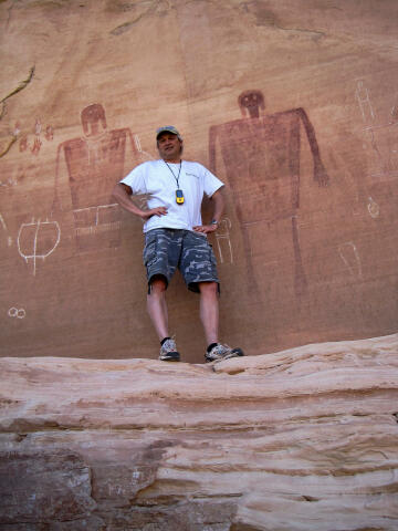 Your tour guide adds some scale to the pictographs