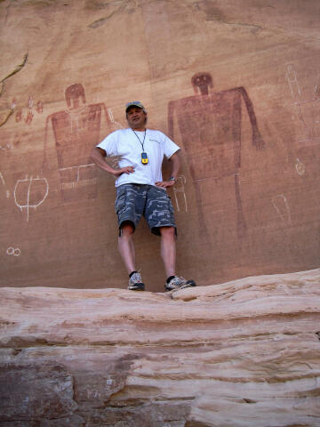 Your tour guide adds some scale to the pictographs