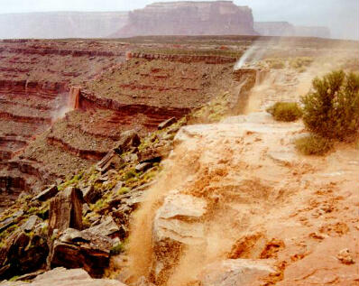 Cedar Point at the rim of the Goosenecks on Aug 10, 1997.   One inch of rain fell during a 30 minute period.