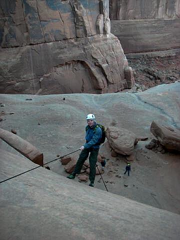 Ben Little rappels to the 3rd tier.