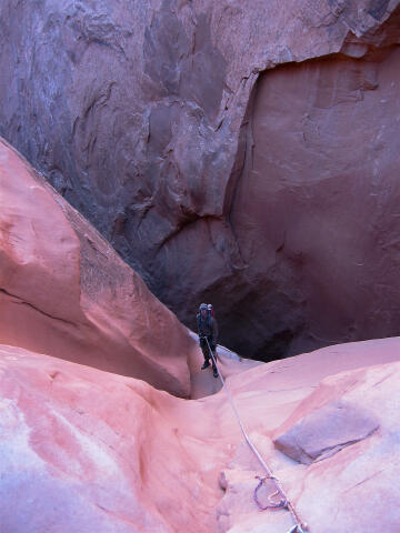 Jason heading down the big rappel.