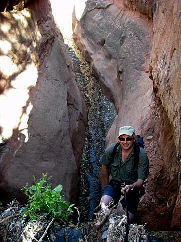 Your favorite  tour guide rappels the log dam.