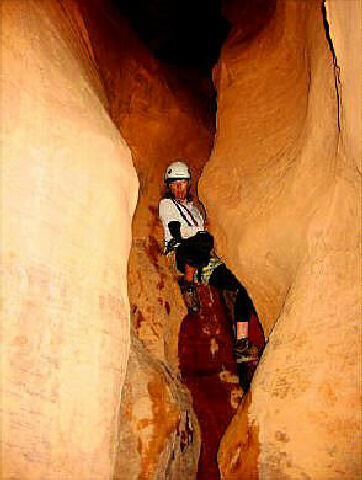 Julie Wallace downclimbs the crux.