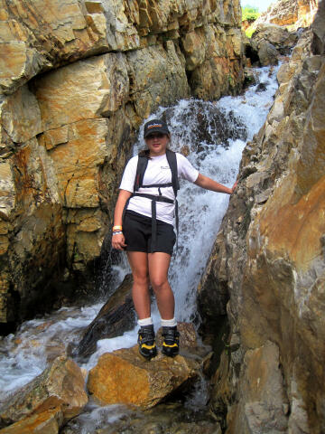 Sierra at the waterfall exiting Secret Lake.